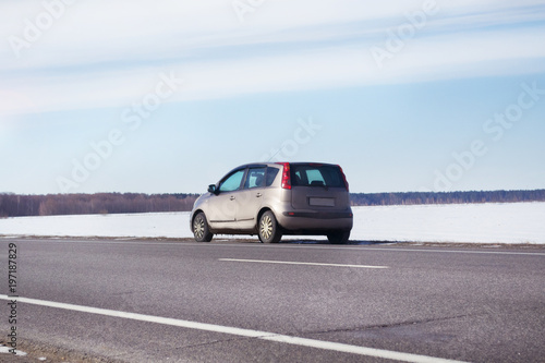 in a beautiful sunny day beige car parked at the side of the highway © mak_alexandra