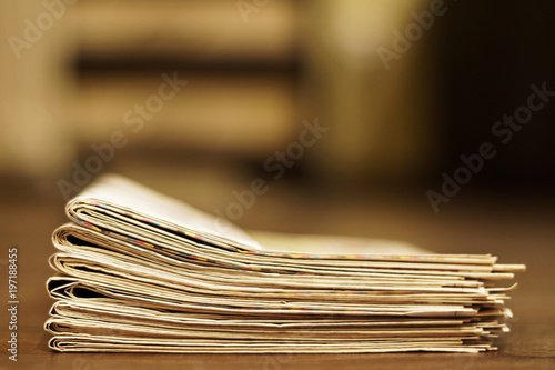 News - Pile of newspapers as information concept, selective focus