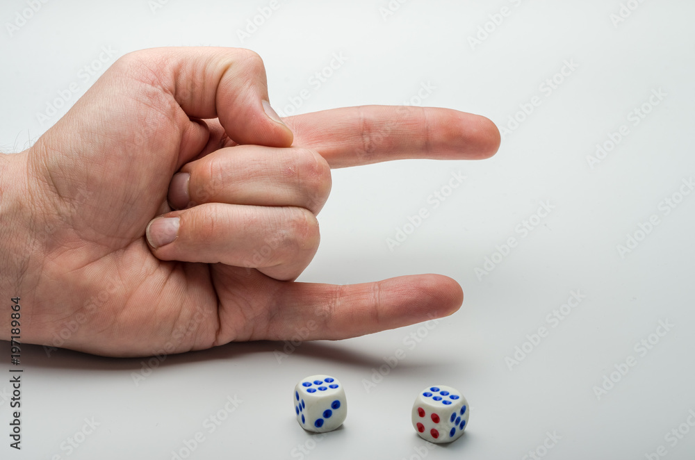 Game dice on which a combination of two sixes fell on a white background