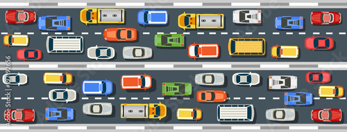Top view from above on a city street speed highway with cars and buses, trees and trucks
