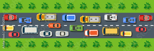 Top view from above on a city street speed highway with cars and buses, trees and trucks