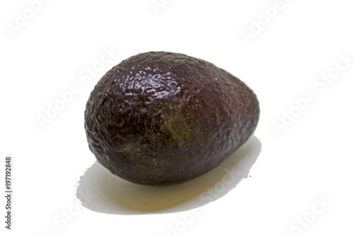 Whole black avocado