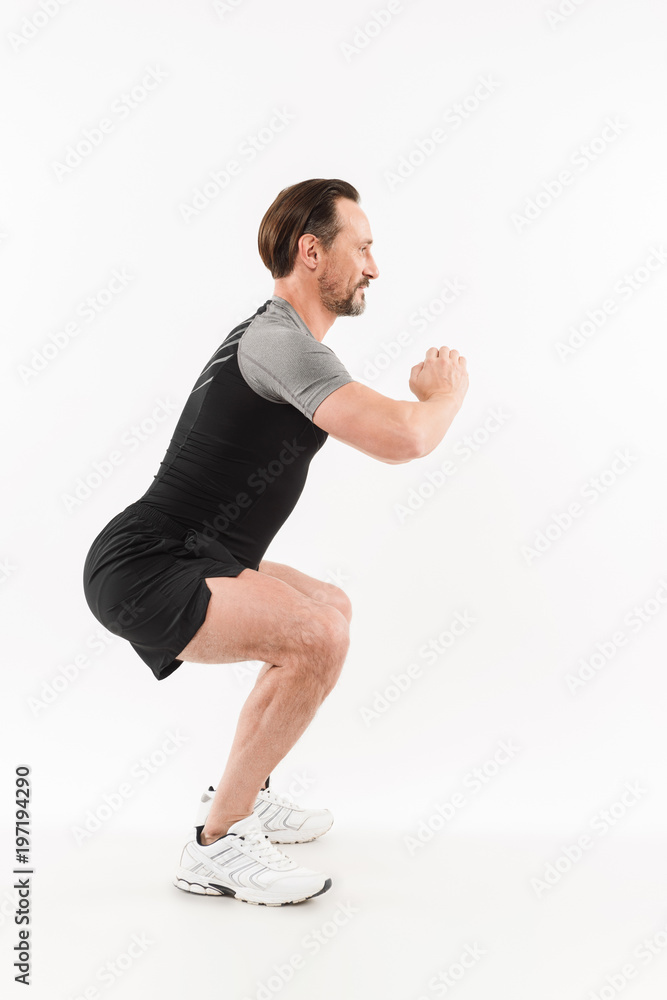 Obraz premium Full length portrait of a fit mature sportsman