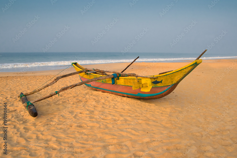 Traditional Sri Lanka Catamaran on the sand beach