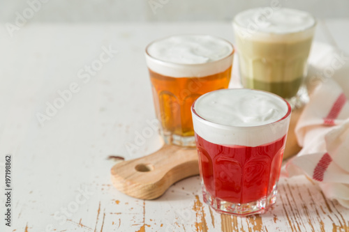 Taiwanese food trend - cheese tea assortment on white wood background