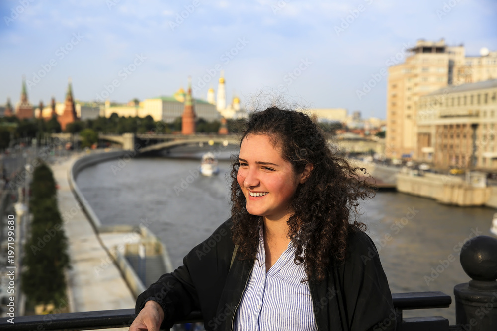 Portrait of beautiful girl on the Moscow city background Portrait of beautiful girl on the Moscow city background