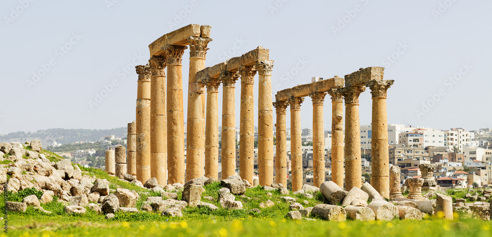 orange color of old columns in antique city Jerash in Jordan