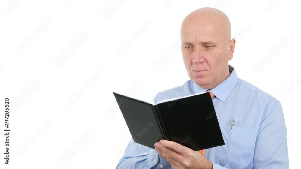 Businessman Take Notes Writing in Personal Agenda Financial Information's Businessman Take Notes Writing in Personal Agenda Financial Information's