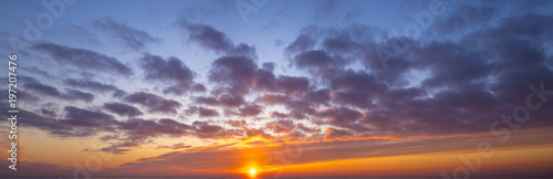 Fototapeta Naklejka Na Ścianę i Meble -  Fiery sunset, colorful clouds in the sky,panorama