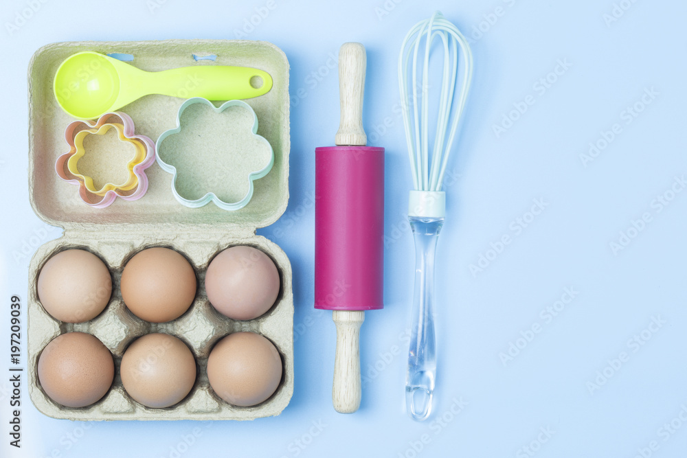 Baking utensils tool pastel style on blue background topview flatlay copyspace. Baking utensils tool pastel style on blue background topview flatlay copyspace.