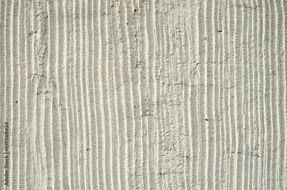 Fototapeta premium Old ecru plaster on wall closeup