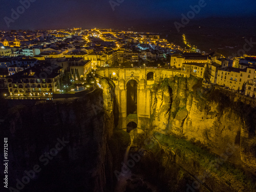 New bridge in Ronda, one of the famous white villages in Andalucia, Spain. Photo from air, March 2018