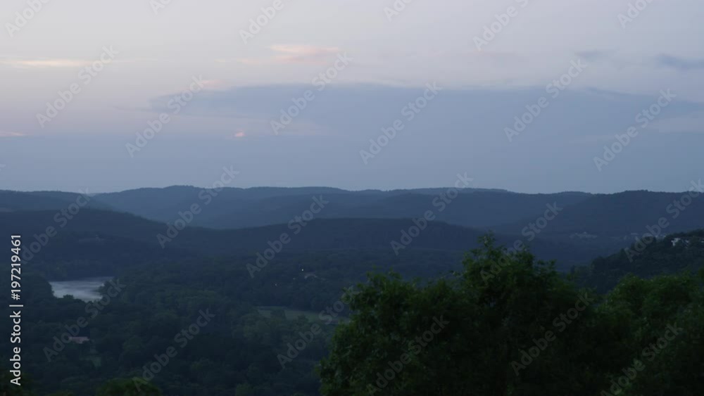 A Beautiful Forest Valley Beneath A Sunrise