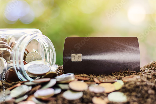 Coin in the glass jar and c...