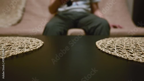 The guy is going to watch TV. close up