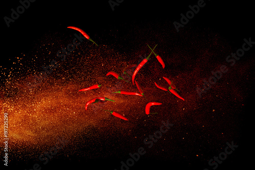 Hot red pepper on a background of ground pepper