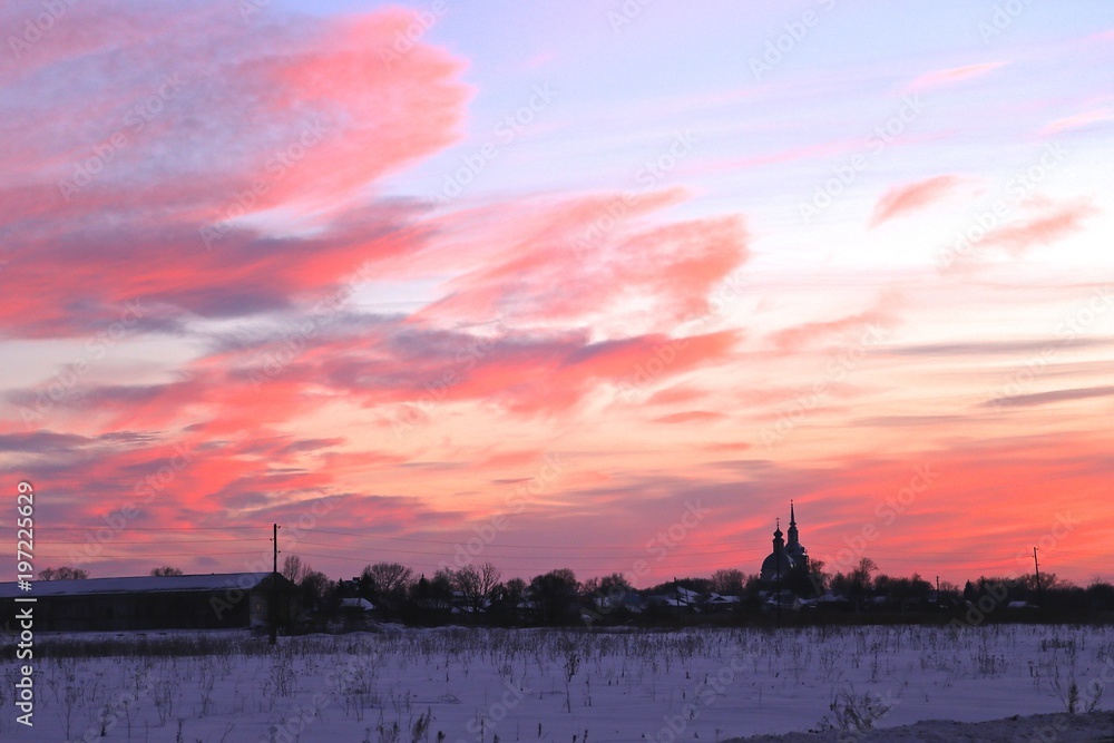 spring March evening pink decline sky nature in the country, in the distance orthodox church spring March evening pink decline sky nature in the country, in the distance orthodox church