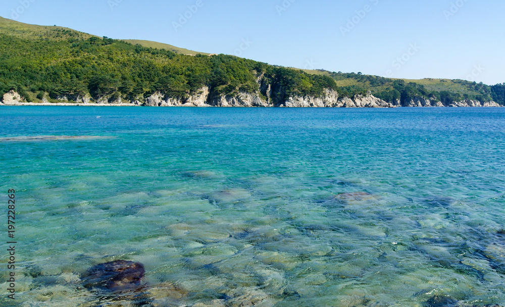 Fototapeta premium Beautiful blue water bay, crystal clean water, blue sky