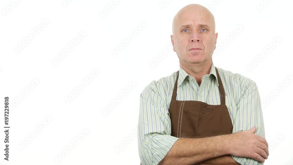 Bakery Sales Person Wearing Apron Stay Serious and Silent in Front of TV Camera Bakery Sales Person Wearing Apron Stay Serious and Silent in Front of TV Camera