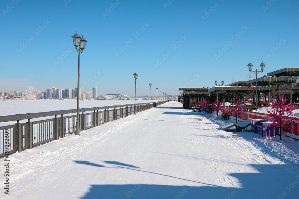 Embankment and city in winter. Kazan, Russia