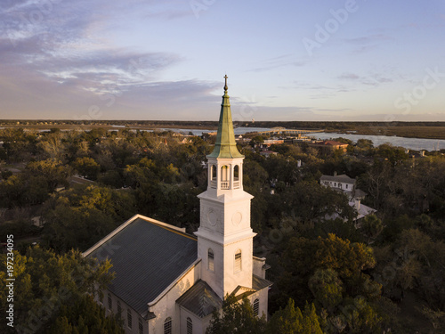 Obraz na płótnie Low aerial view of church steeple in coastal South Carolina, USA.