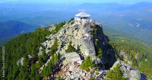 Hiker's Lookout On Top Of Rocky Peak With Pine Forest - Mount Pilchuck Lookout, Washington, USA photo