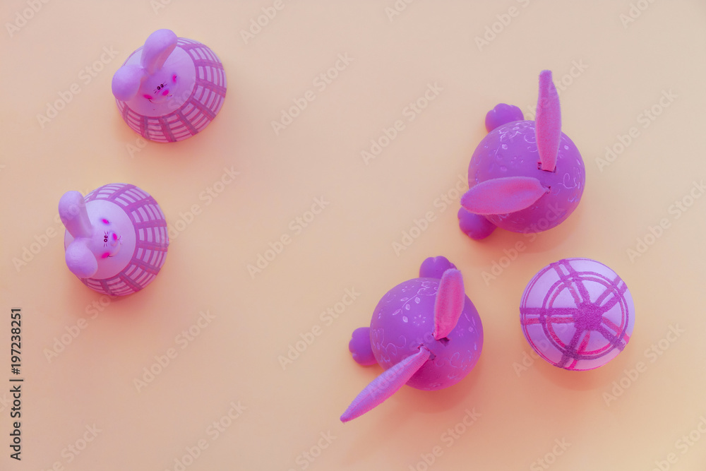 Easter bunny eggs on a purple background