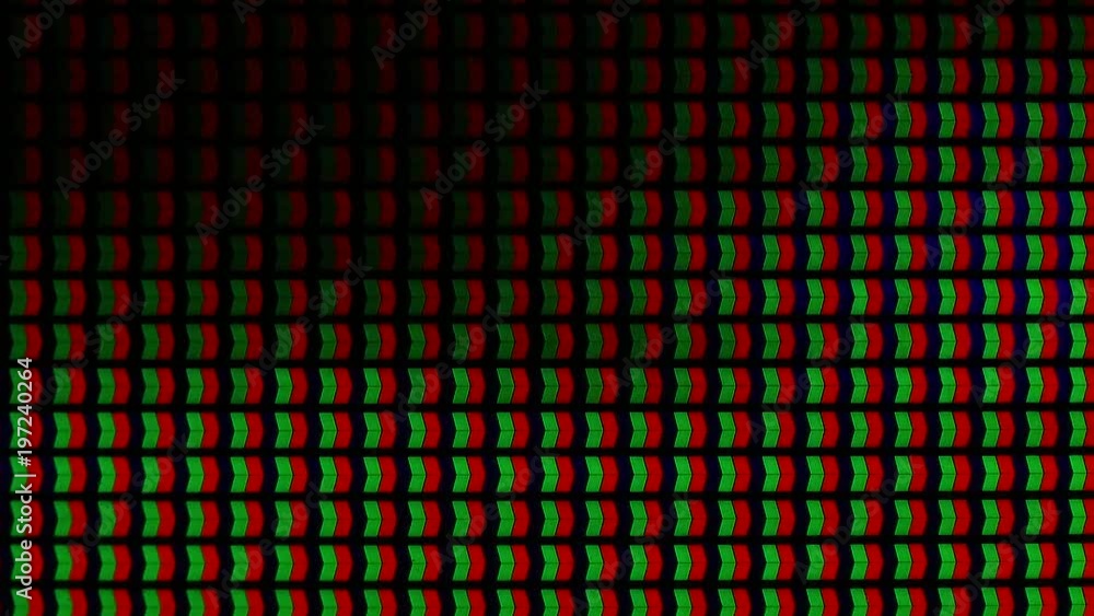 Macro view. Pixels changing colour on a high definition LED TVset screen. Macro view. Pixels changing colour on a high definition LED TVset screen.