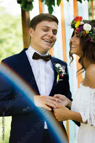 Bride and groom happy about...
