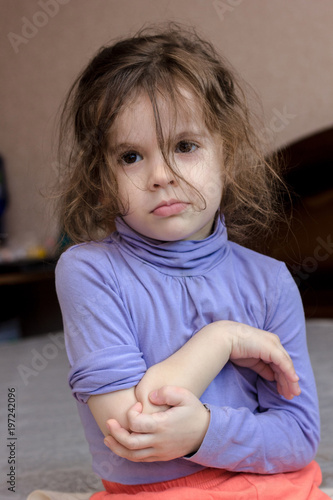 Little kid girl with pain i...