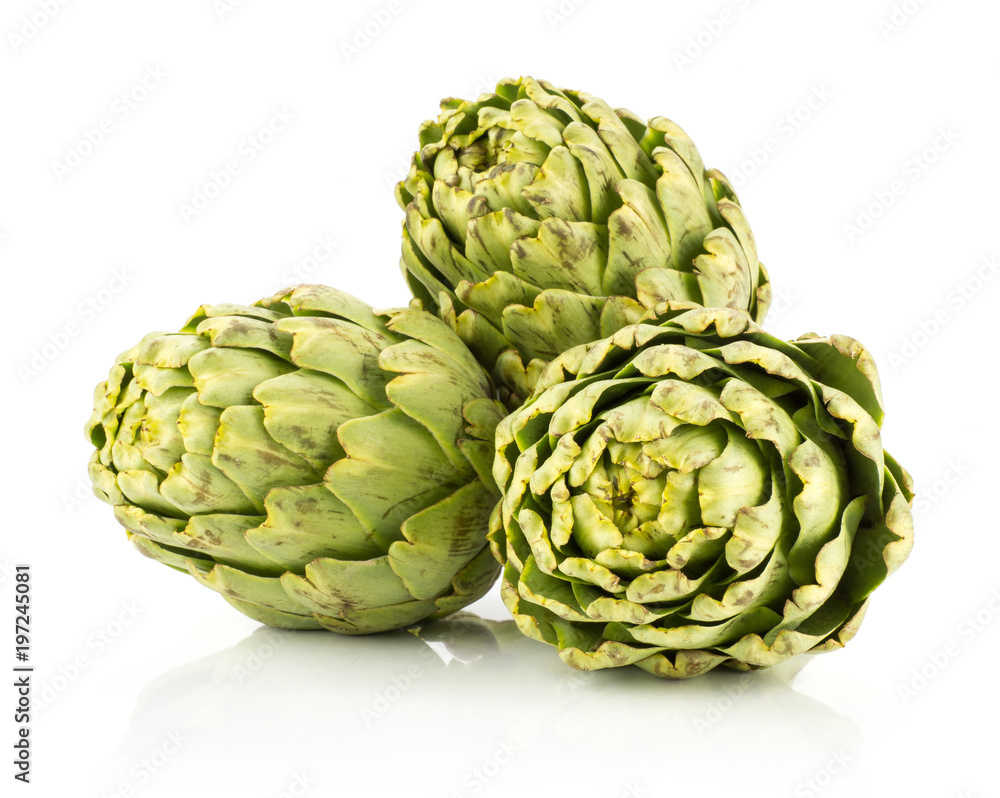 Fototapeta premium Three globe artichoke flowers isolated on white background raw fresh green stack.