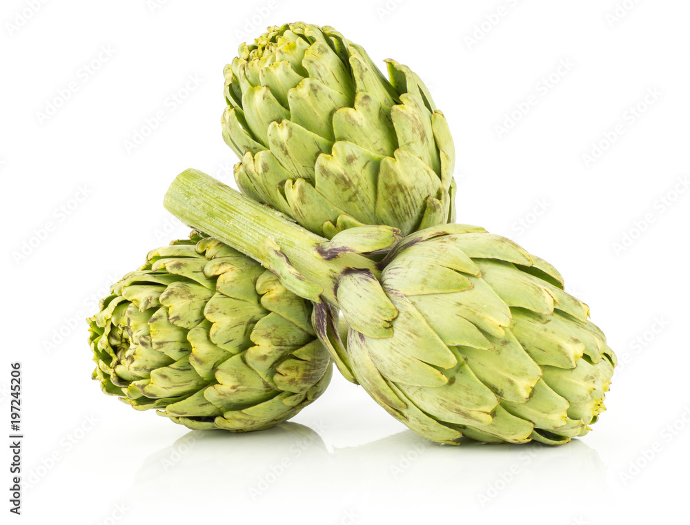Obraz premium Three globe artichoke stack isolated on white background fresh raw green.