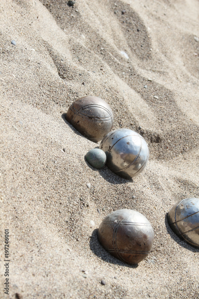 Balls for playing bocce on the sand Balls for playing bocce on the sand