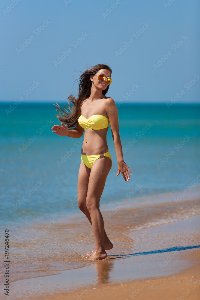 yellow bikini sea, jumping yellow bikini sea, jumping