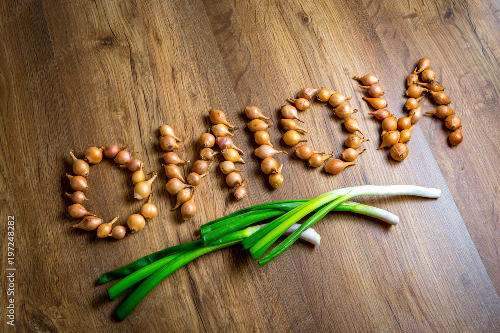 Fresh onions. Onions background. top view, place for the text Fresh onions. Onions background. top view, place for the text