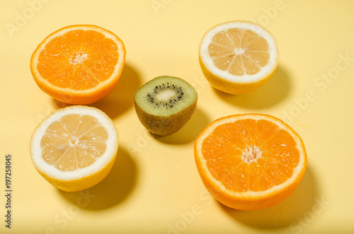citrus on a yellow background. healthy eating. concept of diet