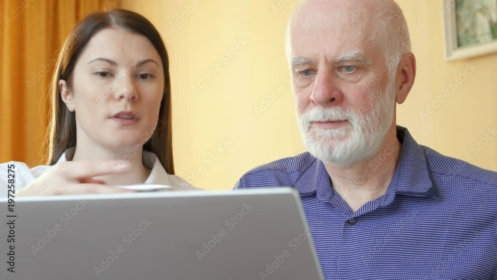 Senior retired man meeting young successful financial adviser for pension plan. Professional female consultant explaining senior male client financial investments options Senior retired man meeting young successful financial adviser for pension plan. Professional female consultant explaining senior male client financial investments options