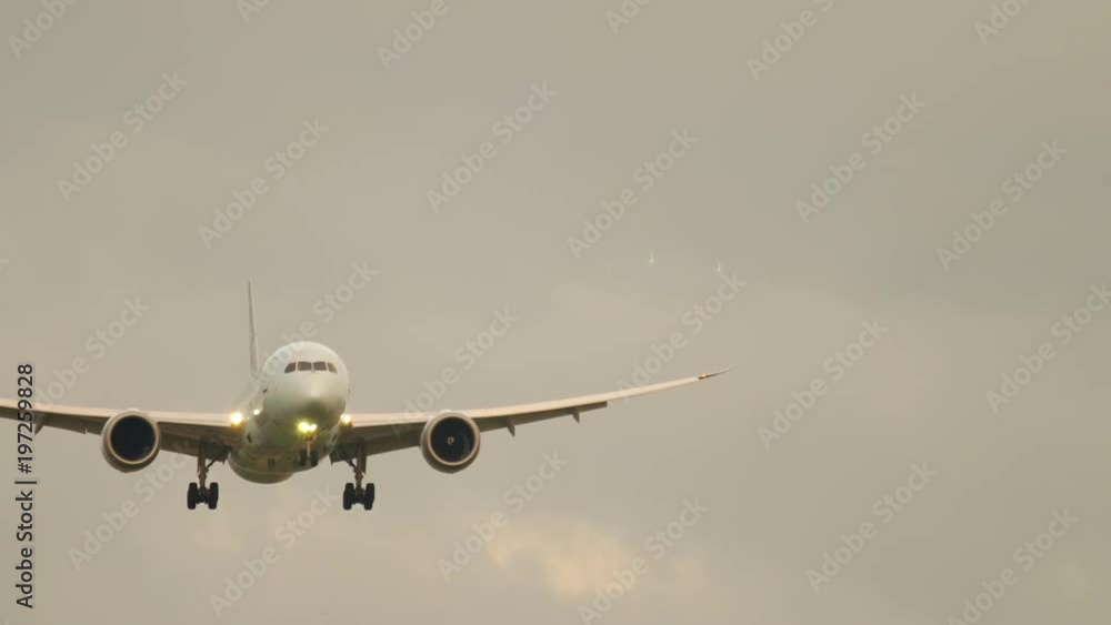 Airplane approaching at the early morning Airplane approaching at the early morning