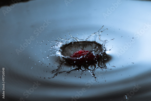 Raspberry splashing into water