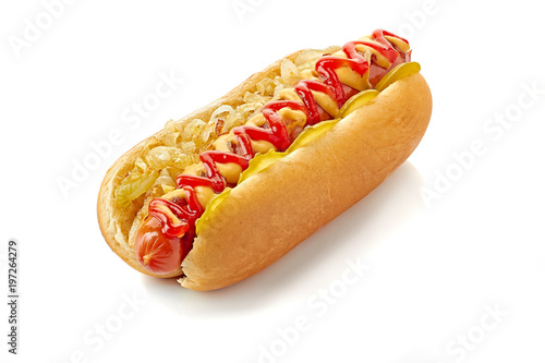 Photo Hot dog with fried onion and cucumber on white