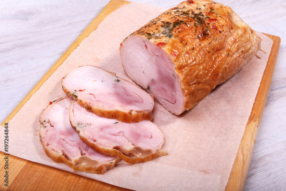 Homemade meatloaf from pork meat with spices on cutting board. Homemade meatloaf from pork meat with spices on cutting board.