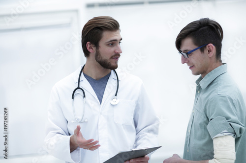 doctor gives advice to his patient
