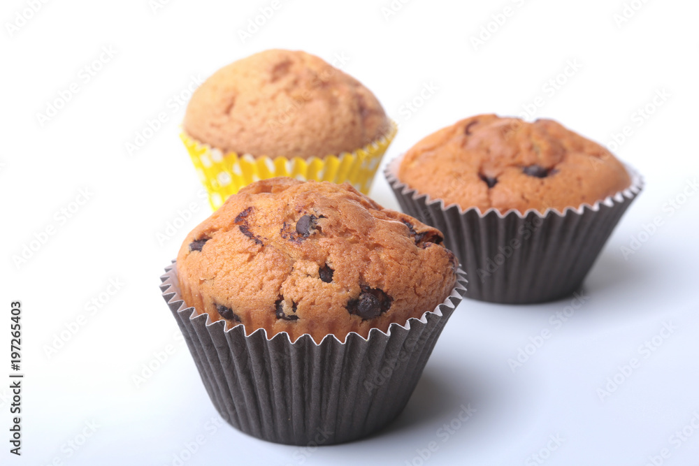 Homemade muffin with raisins and chocolate cupcake. selective focus Homemade muffin with raisins and chocolate cupcake. selective focus