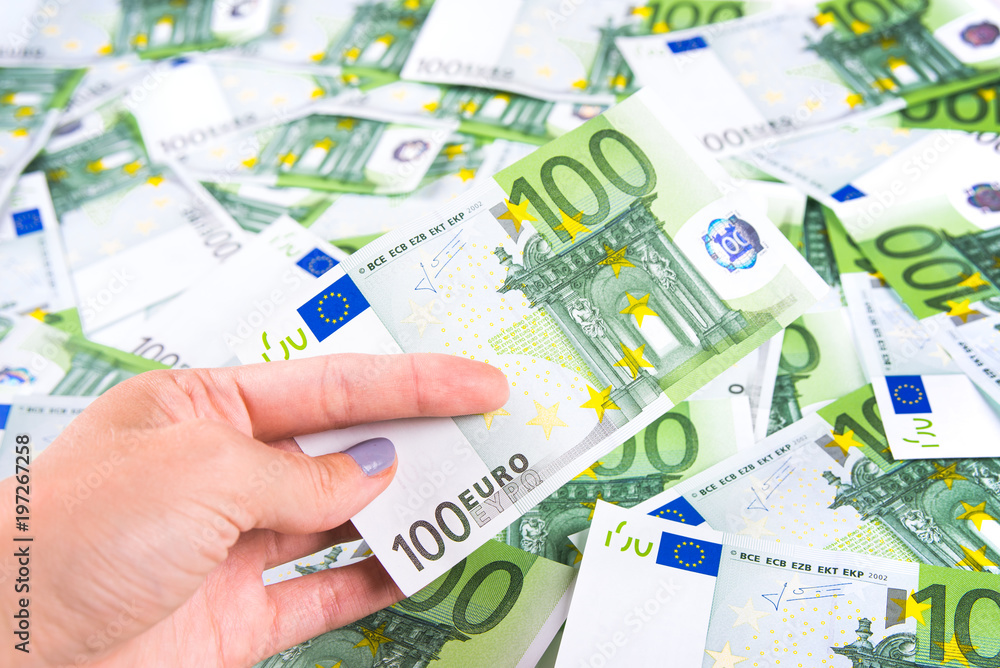 Woman is save One hundred euro banknote at texture background Woman is save One hundred euro banknote at texture background