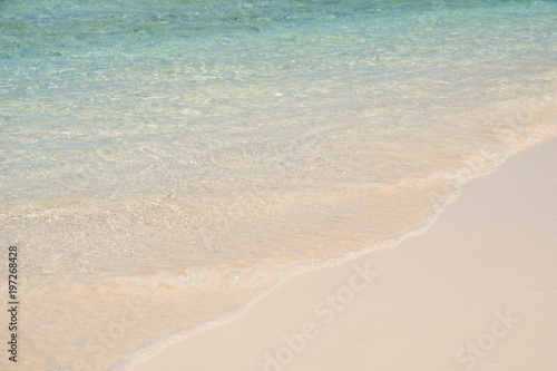 clear water on clean white sand beach closeup