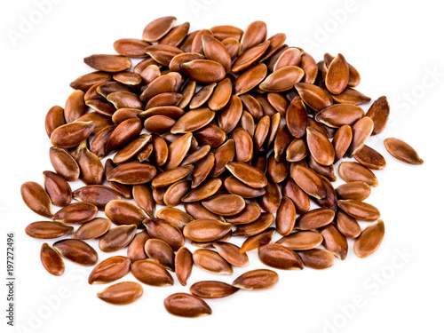 Close up of flax seeds isolated on white background