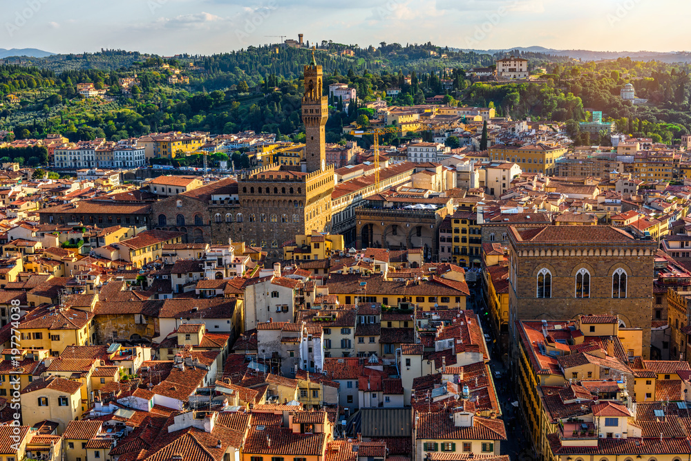 Fototapeta premium Aerial view of Florence and Palazzo Vecchio in Piazza della Signoria in Florence, Italy. Architecture and landmark of Florence.