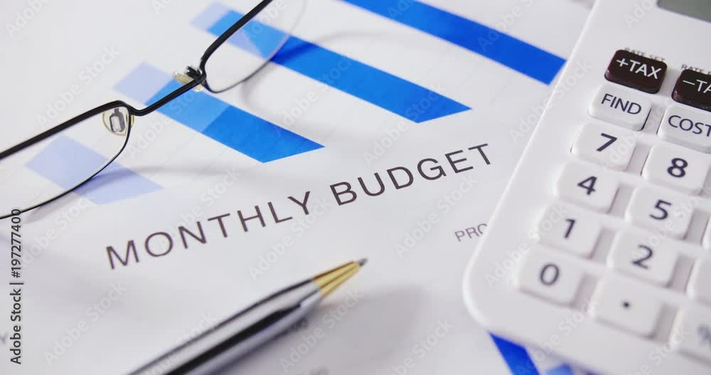 Dolly Shot Of Pen And Calculator On Monthly Budget 4K Dolly Shot Of Pen And Calculator On Monthly Budget 4K