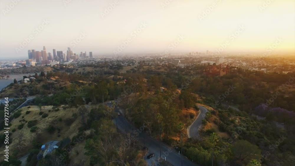Aerial arc dolly shot above Los Angeles during sunset Aerial arc dolly shot above Los Angeles during sunset