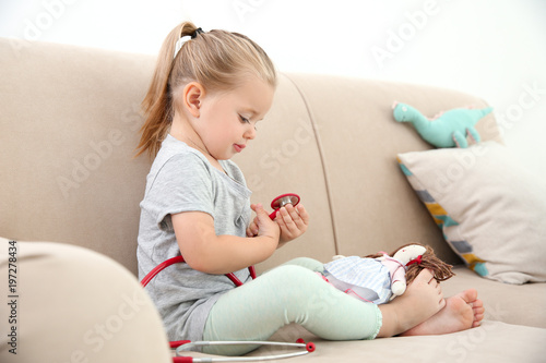 Cute little girl with steth...